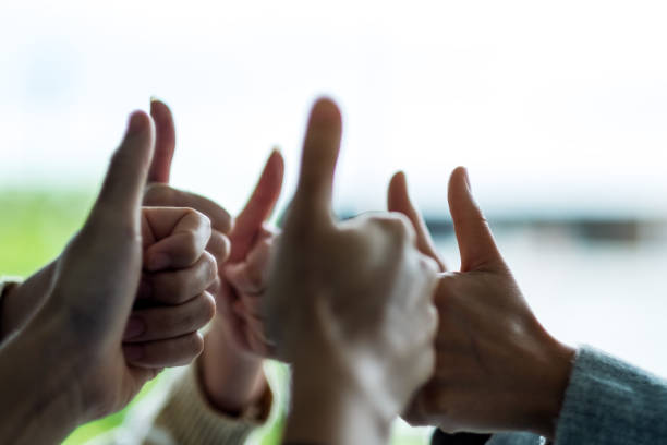 istock A group of people making thumb up hands sign 1285206848