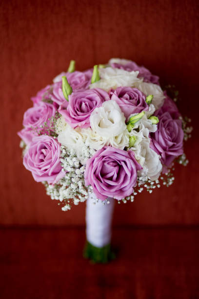 istock Purple and white bridal bouquet 1285206858