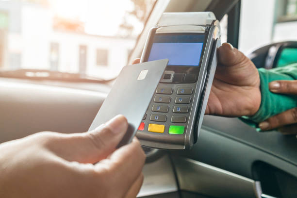 istock Customer makes contactless payment by credit card 1285211286