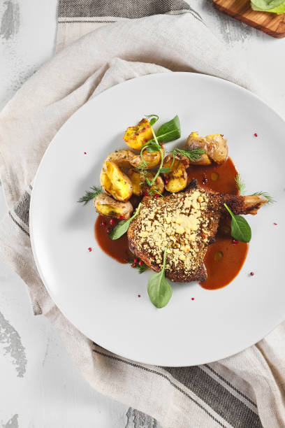 istock Roasted Pork Loin and Potatoes with Demi-Glace 1285212983
