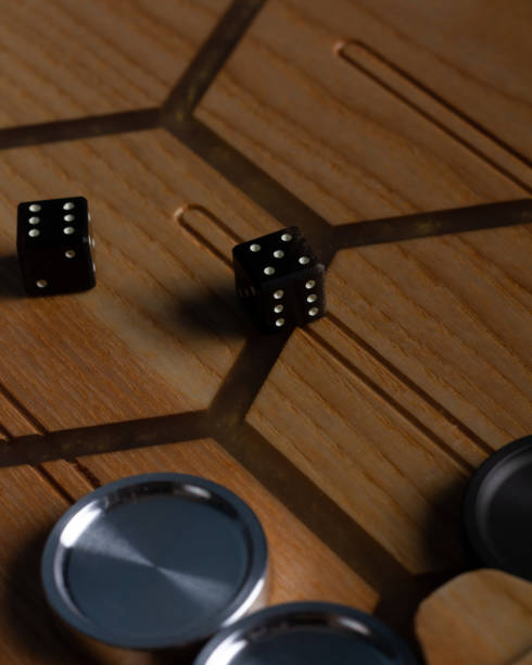 istock Color detail of a Backgammon game with two dice close up. 1285214677