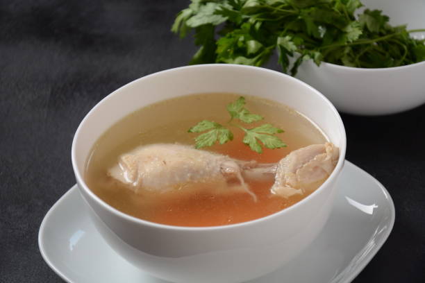 istock Chicken bouillon broth,  boiled meat chicken leg. 1285215761