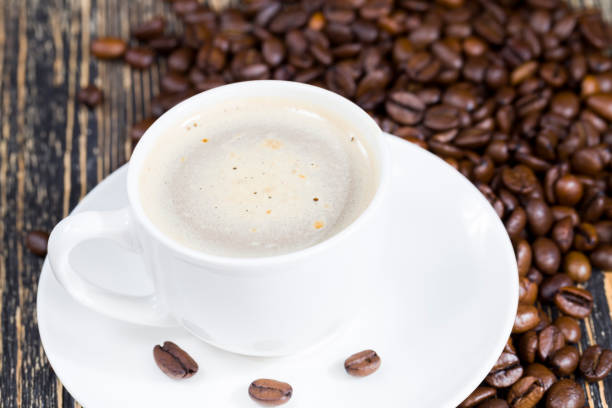 istock aromatic coffee and whole coffee beans 1285218208