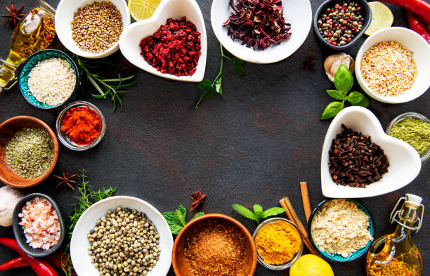 istock Various spices in a bowls on a black 1285223399