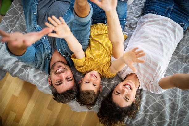 istock Happy family having fun time at home 1285225808