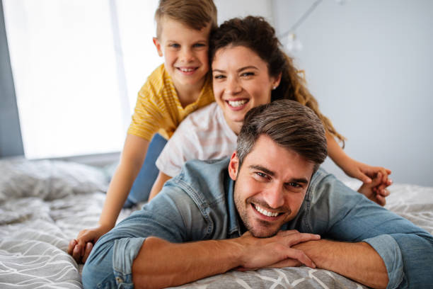 istock Happy family having fun time at home 1285225819