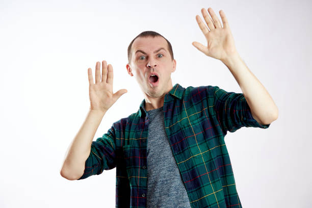 istock Guy looks surprised, confused. Unexpected emotions, bewilderment and shock man 1285227816