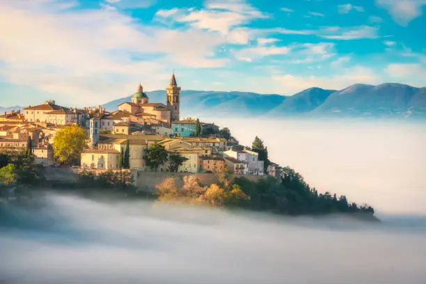 Trevi picturesque village in a foggy morning. Perugia, Umbria, Italy, Europe.