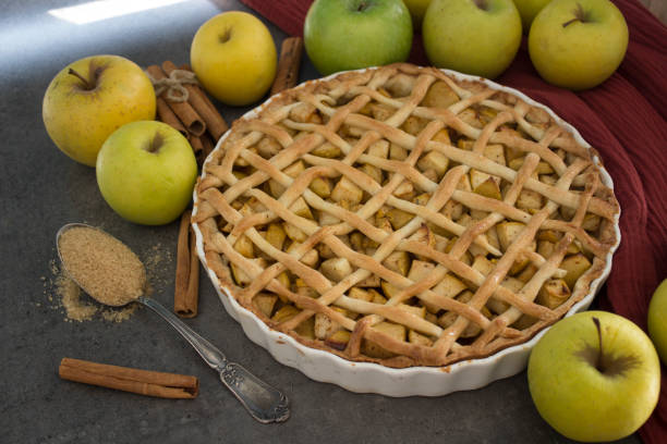 istock Garden apples and pie on fabric background. 1285233829
