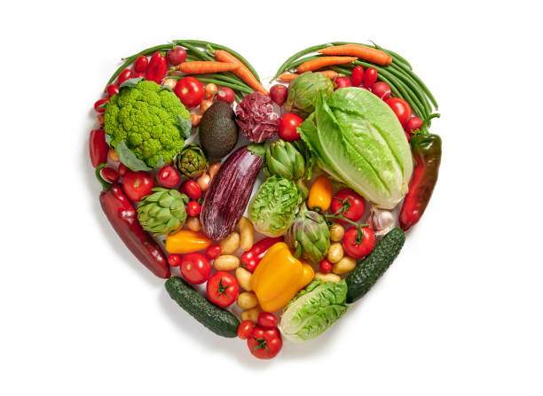 istock Heart shape by various vegetables. Healthy food concept. top view 1285234672