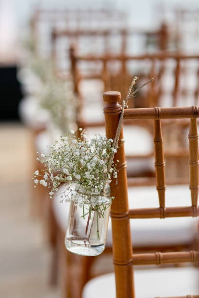 istock Classic chair decorated with bottle flower at the beach 1285236551