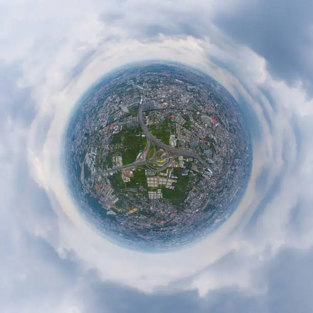 Photo of Little planet 360 degree sphere. Panorama of aerial view of cars driving on highway junctions. Bridge street roads in connection network of architecture concept. Urban city, Bangkok, Thailand.