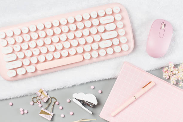 istock flat lay pink stationery on work desk 1285240751