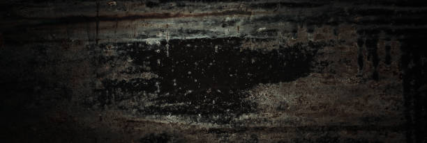 istock Old black rusty rough shabby metal texture 1285245404