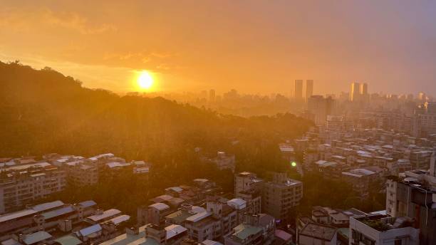 istock Sun shower in the city with mountain on background 1285246488
