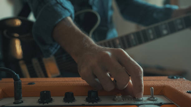 istock Rock guitarist playing guitar at home, alone during Covid-19 lockdown 1285246797