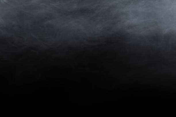 Photo of Smoke or fog isolated on black background