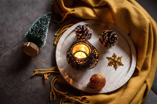 Hygge, candle, light, yellow, wool, blanket, cozy, brown, christmas, fir tree, artificial, top view