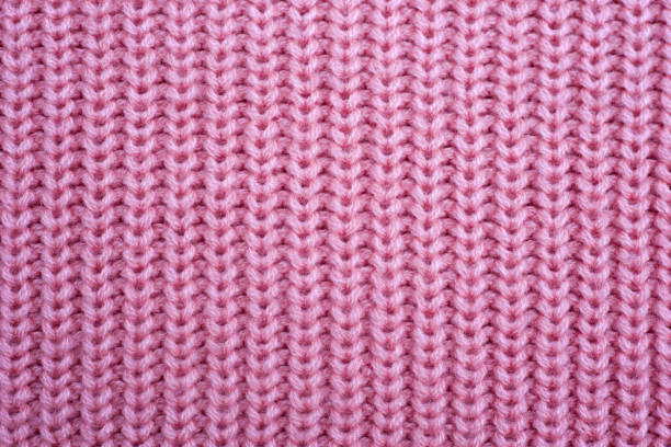 istock knitted purple sweater, knit texture, background 1285251838