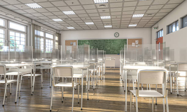 istock interior of a school with desks equipped with protective plexiglass screens 1285253754