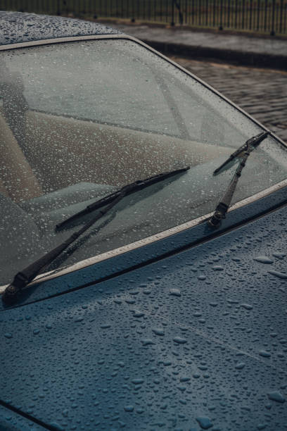 istock Raindrops on a car on a rainy autumn day. 1285254241