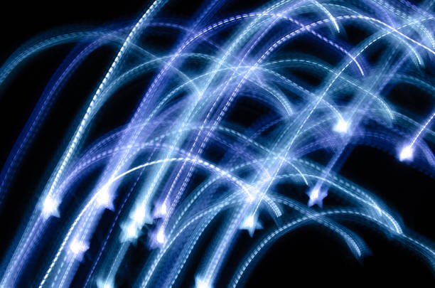 istock glowing lines on a black background, friezlight 1285256946