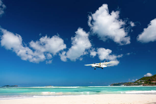istock Plane landing on Nikki Beach, St. Barthelemy 1285257618
