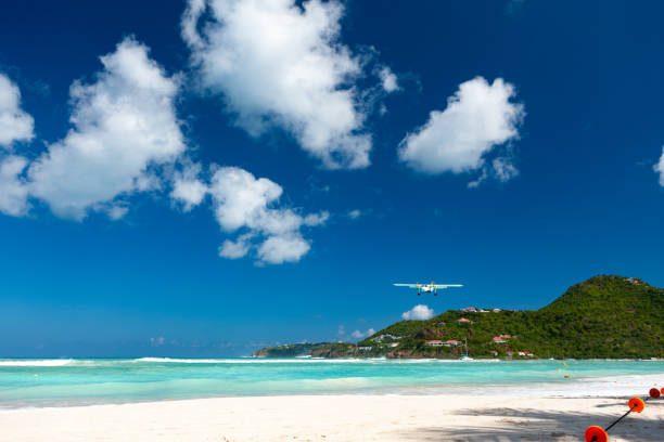 istock Plane landing on Nikki Beach, St. Barthelemy 1285257619