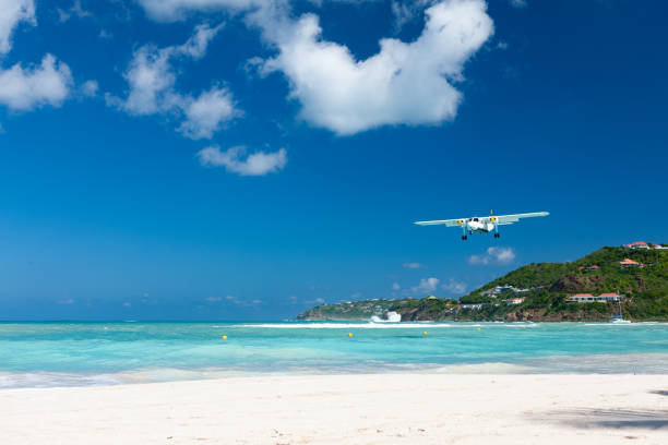 istock Plane landing on Nikki Beach, St. Barthelemy 1285257622