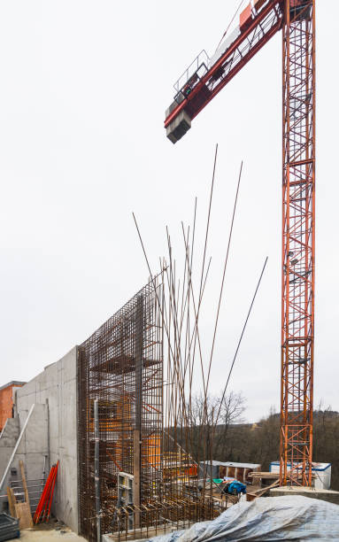 istock Construction of reinforced concrete retaining wall with buttress. Rebar 1285258338