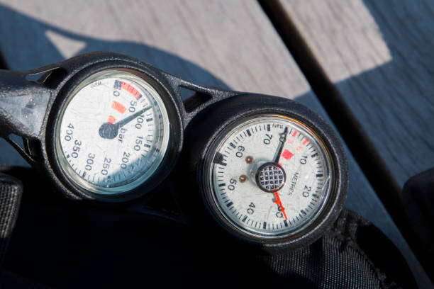 Scuba diving pressure and depth gauge close up.