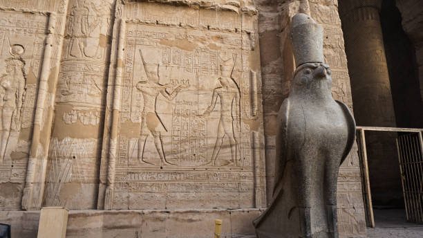 istock Edfu temple and Horus granite stone statues at the palace gate 1285262261