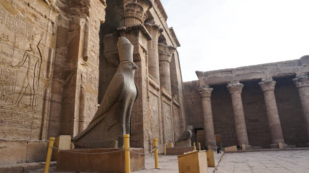 istock Edfu temple and Horus granite stone statues at the palace gate 1285262301