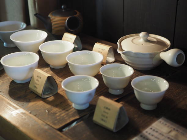istock Traditional Japanese green tea set with white ceramic cups 1285262594