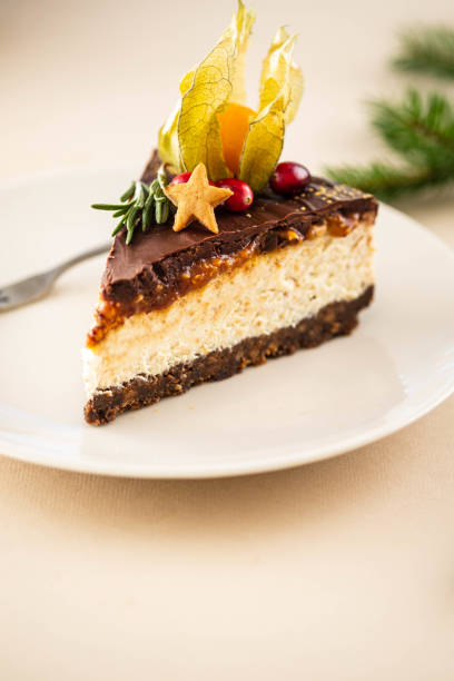 istock Christmas cheesecake with nuts on a Christmas background. 1285263476