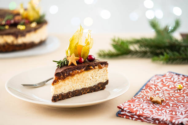 istock Christmas cheesecake with nuts on a Christmas background. 1285263546