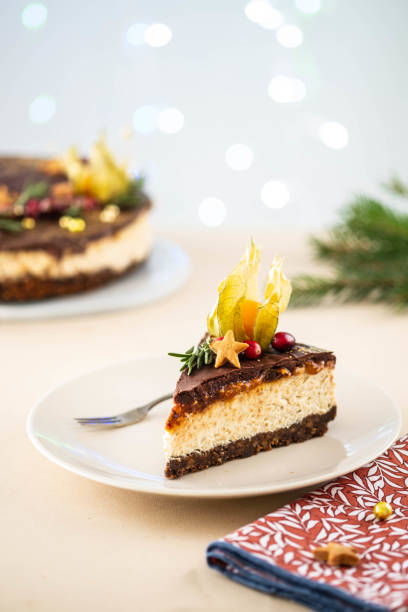 istock Christmas cheesecake with nuts on a Christmas background. 1285263583