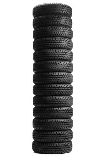 Pile of vehicle tires isolated on white background