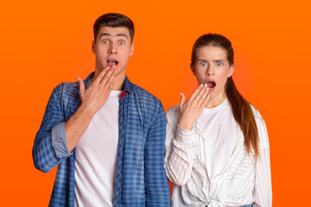 istock Funny surprised couple see something strange and scared 1285266716