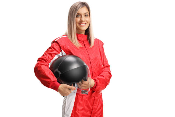 istock Smiling female racer holding a helmet 1285267197
