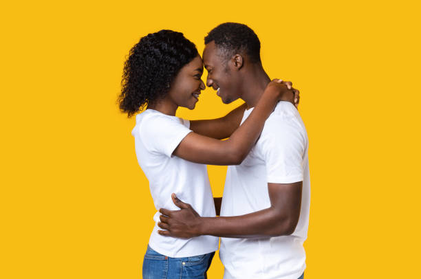 istock Black lovers hugging and looking at each other 1285268296