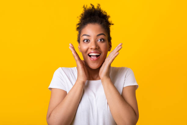 istock Impressed african american woman looking at camera 1285270412