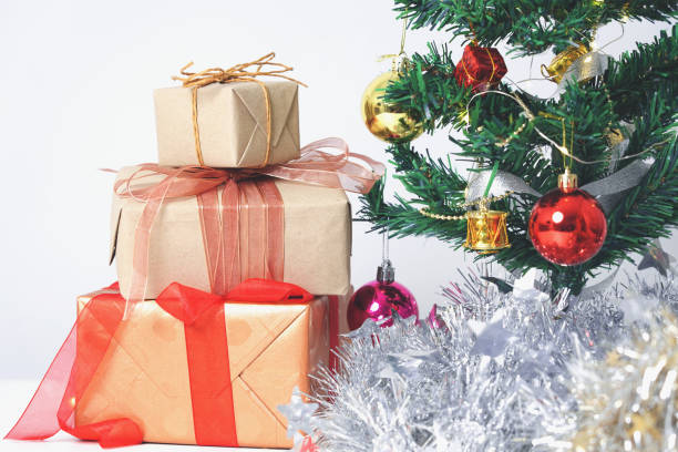 istock Christmas composition with decorations and gift box with bows on white background. winter, new year concept. Flat lay, top view, copy space. 1285270546