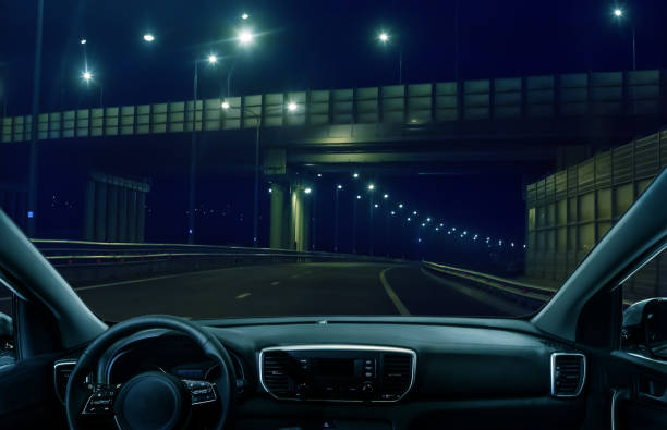 istock View from the car on the night multi-level highway 1285271035