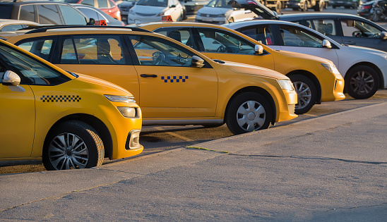 Greenwich village, Manhattan, New York, USA - March, 2024. Yellow taxi rank with queue of taxis in Greenwich Village, Manhattan, New York.