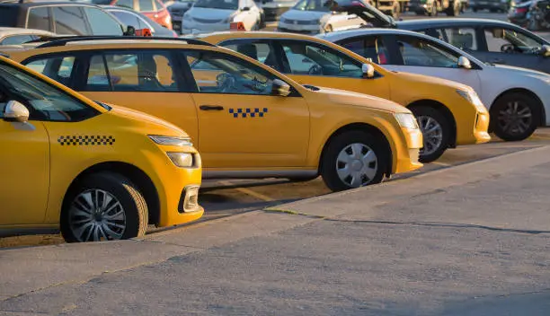 yellow taxi in the parking lot