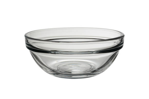 istock Empty glass bowl for salads and cooking. Isolated on a white background 1285274143