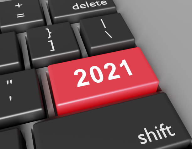 istock Celebration concept. Number 2021 you on button of computer keyboard 1285275087