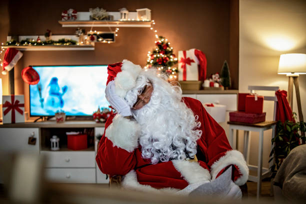 istock Santa is resting from reading letters he received from children - Santa is resting and getting ready to bring presents 1285275334