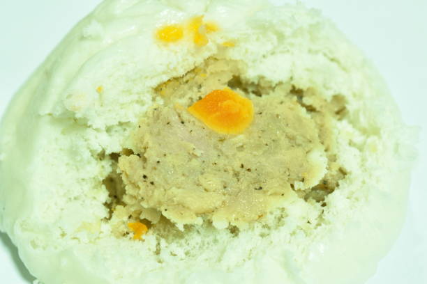 istock steamed bao Chinese bun stuffing mashed pork and salt egg on white background 1285276829